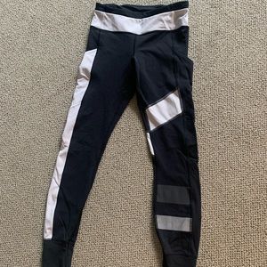Lululemon black and white design speed tight with reflective stripes size 4